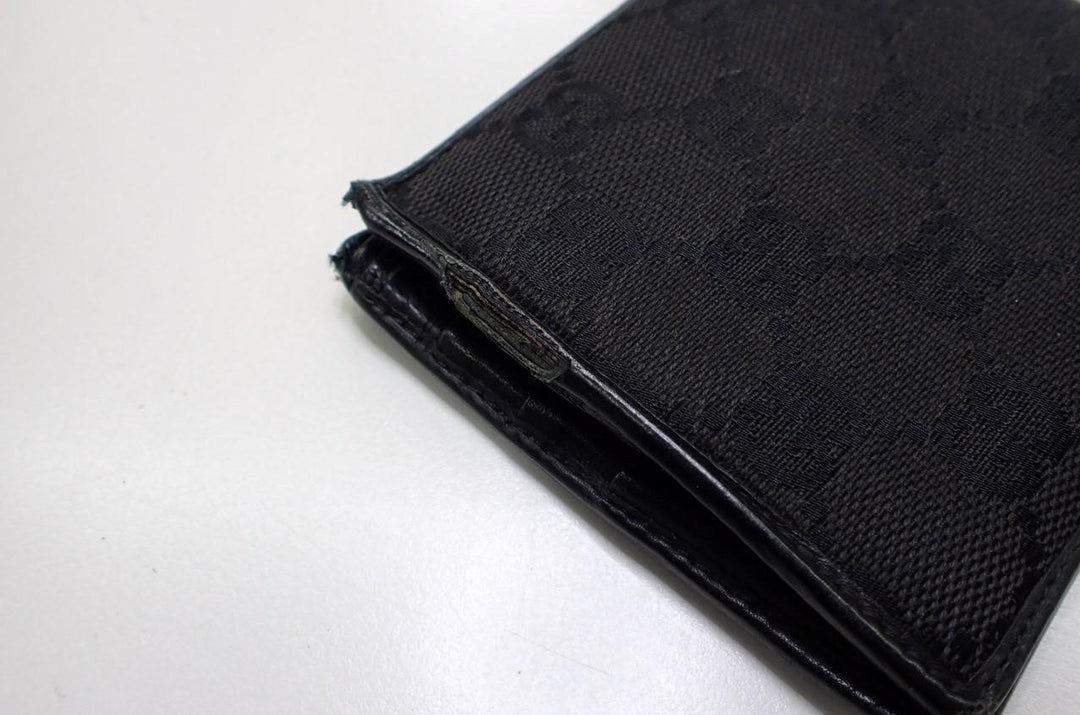 Black GG Canvas Bi-Fold Wallet